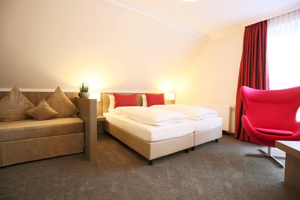 Boutiquehotel Myn Utspann Husum  Bilik gambar