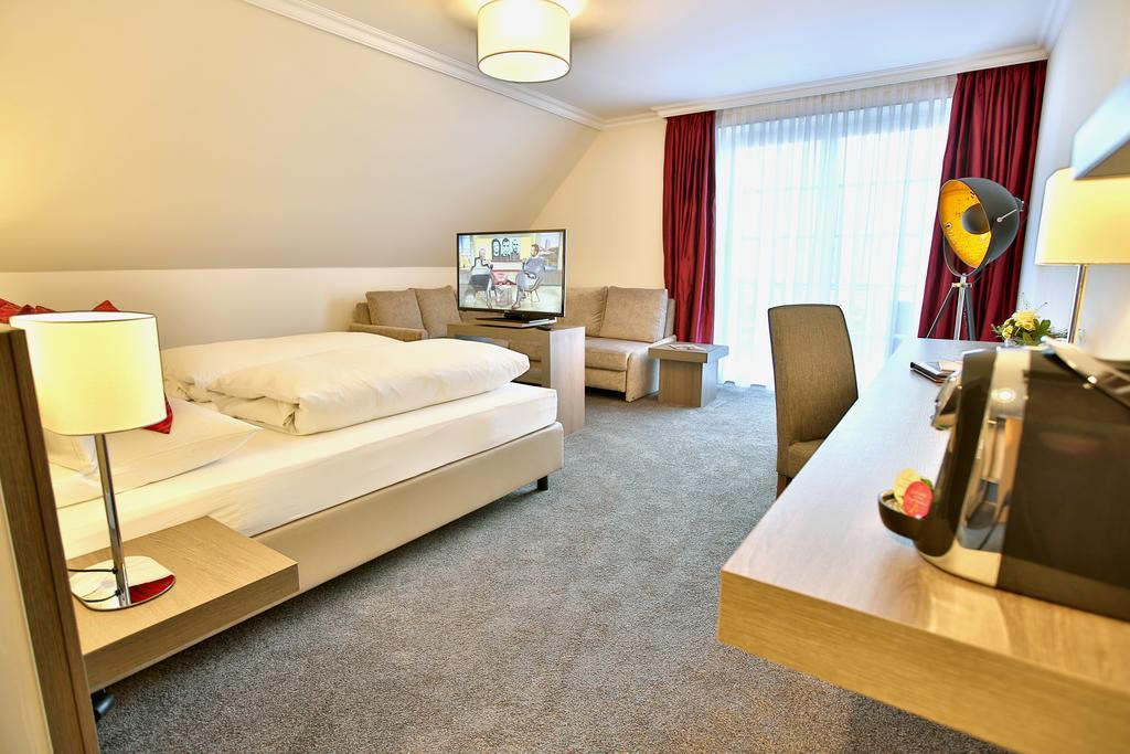 Boutiquehotel Myn Utspann Husum  Bilik gambar